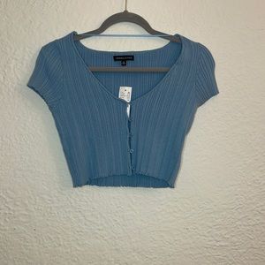 Blue short sleeve button-up crop top